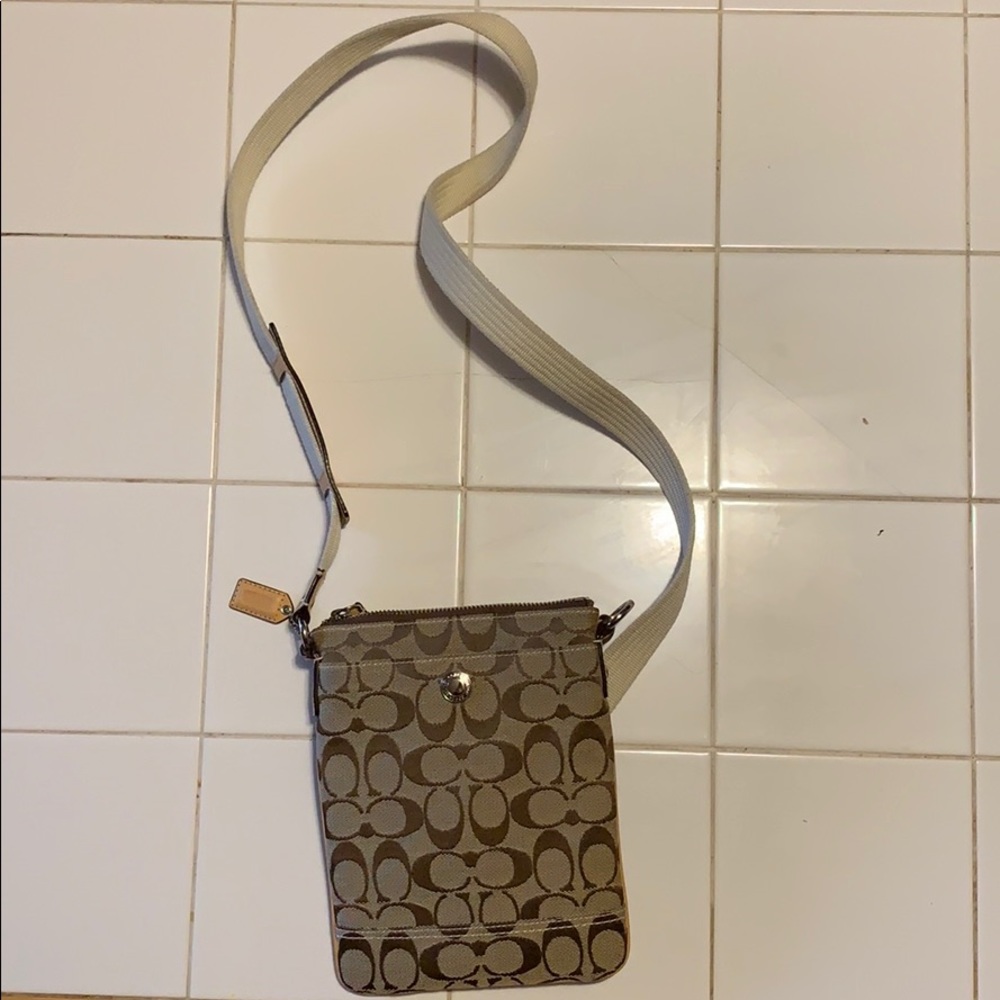 Small coach satchel never used